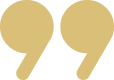 Gold quotation marks on black background.
